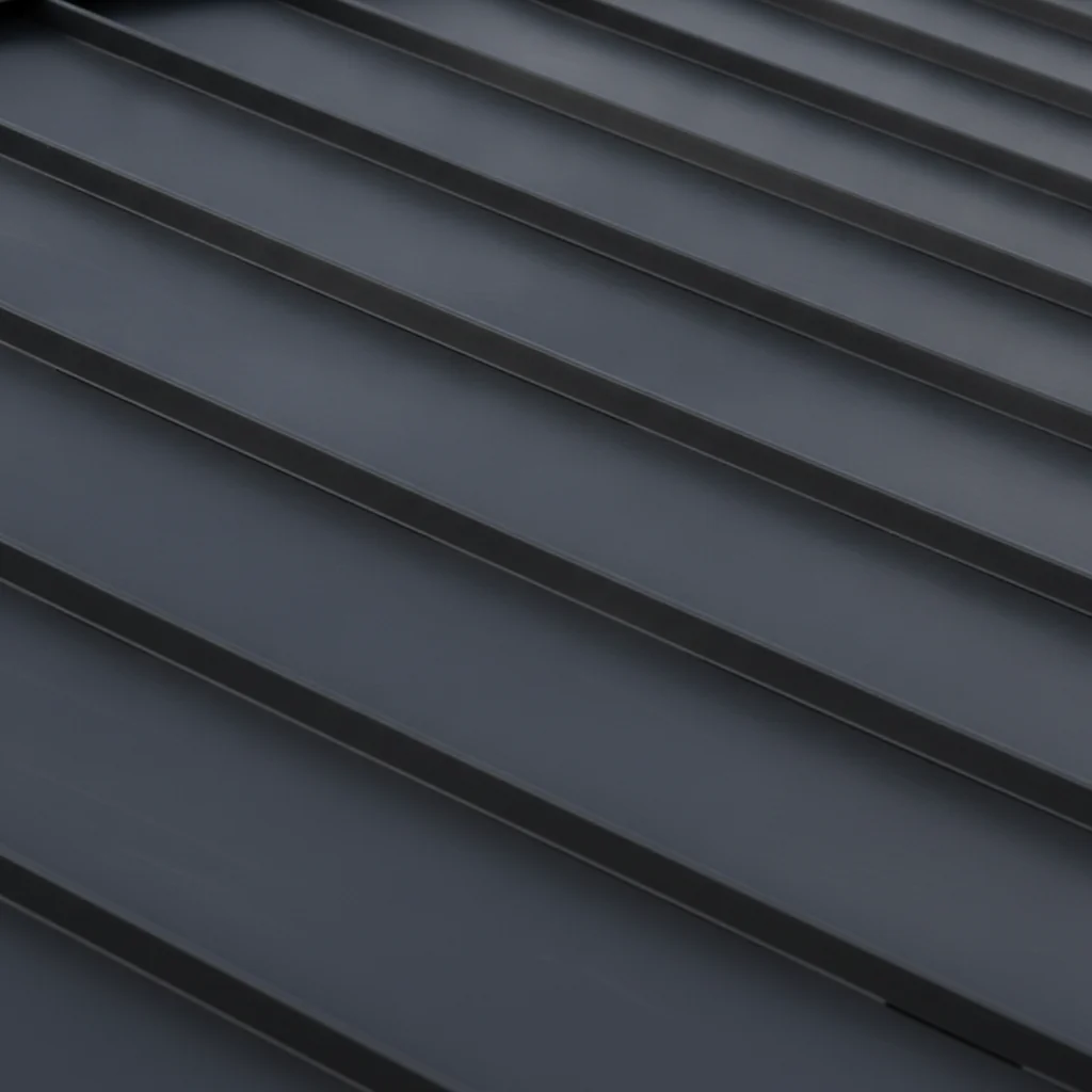 Standing seam metal roof panels on a modern home